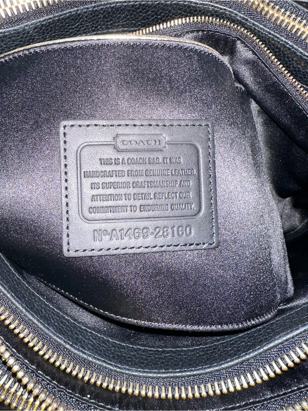 2014 Coach Borough Bag featuring gold-tone hardware and signature zipper pulls.